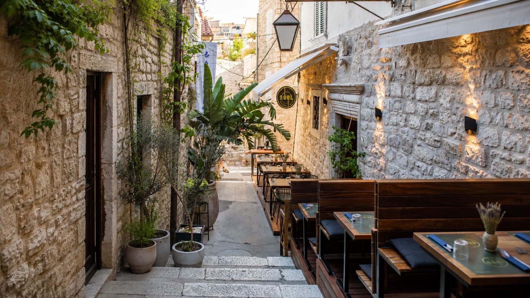 Soul Kitchen fine dining restaurant, Hvar old town - stone alleyway, candlelit terrace
